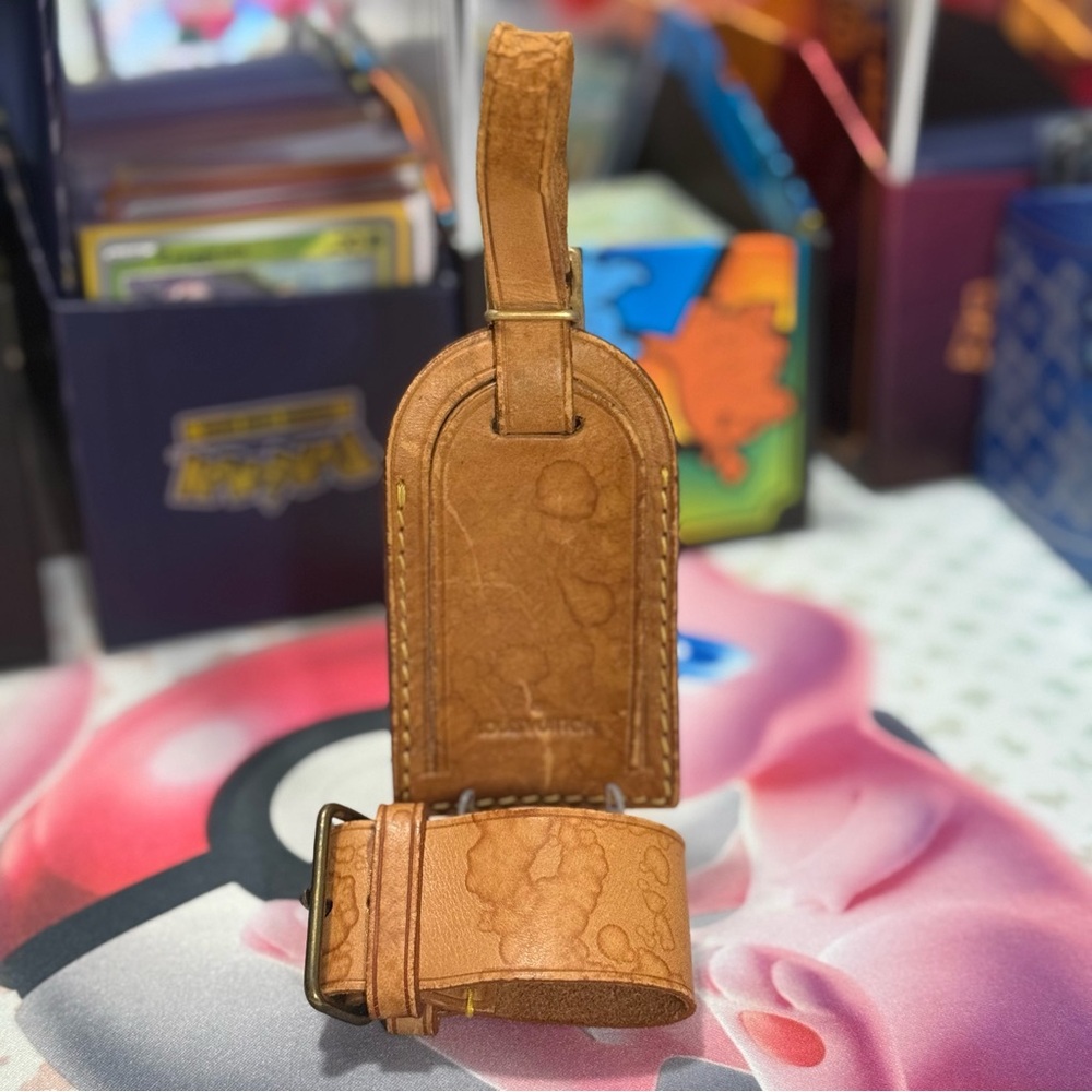 Louis Vuitton Luggage Tag and Poignet in good condition (01)